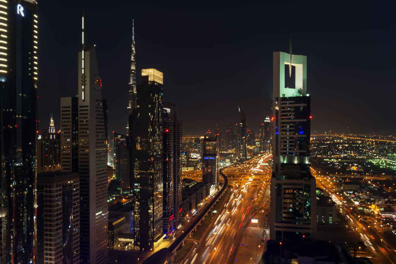 Dubai night tour showcasing illuminated landmarks including Dubai Marina, Palm Jumeirah and Burj Al Arab
