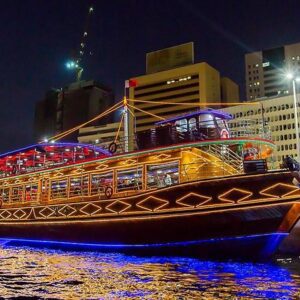 Premium dinner cruise on Dubai Creek offering luxury dining, sightseeing, and a top Dubai tourism experience with historic waterfront and night city views