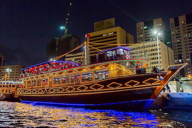 Premium dinner cruise on Dubai Creek offering luxury dining, sightseeing, and a top Dubai tourism experience with historic waterfront and night city views
