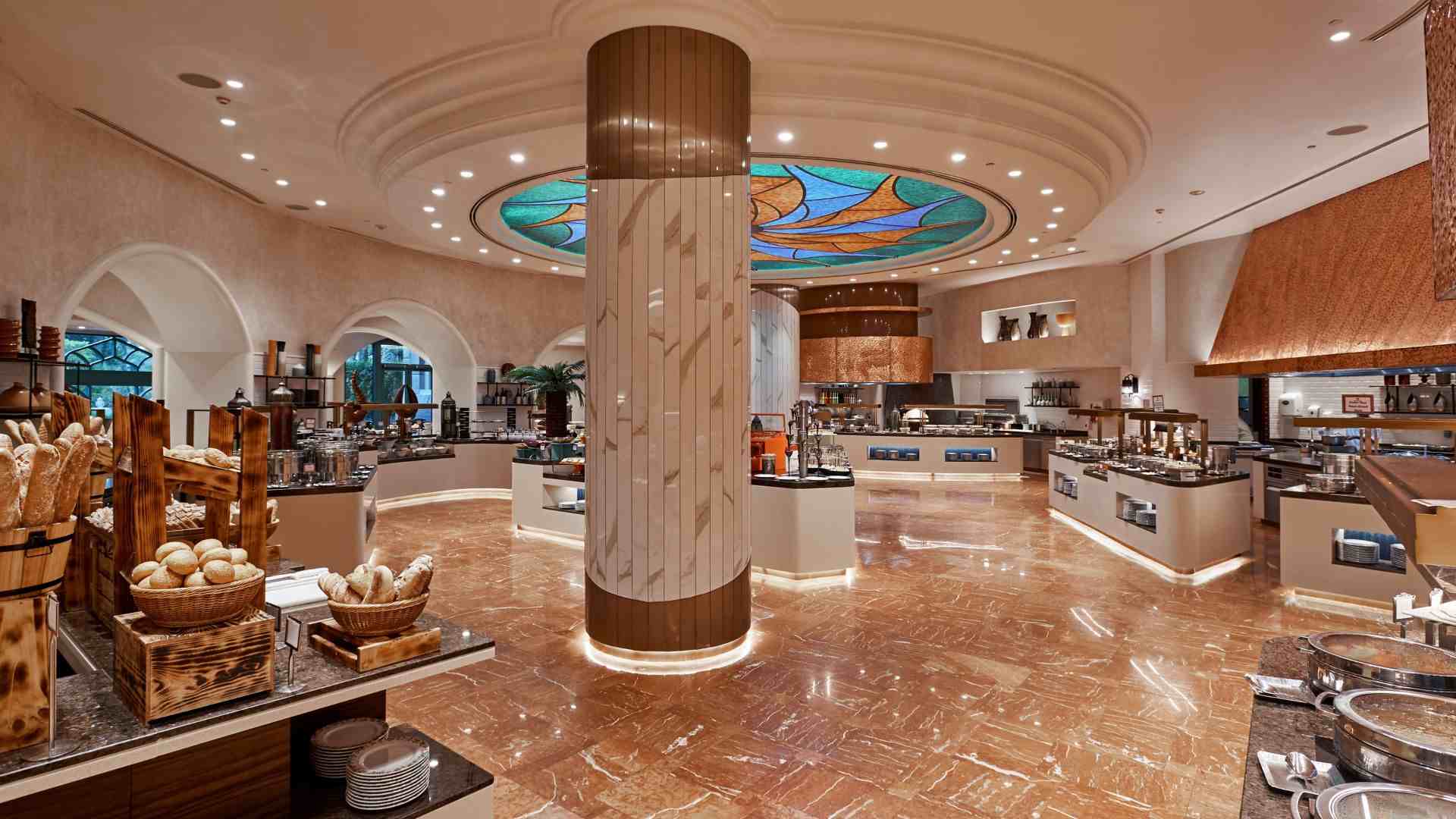 Dubai buffet dinner experience at Atlantis The Palm Kaleidoscope restaurant with international cuisine and live food stations