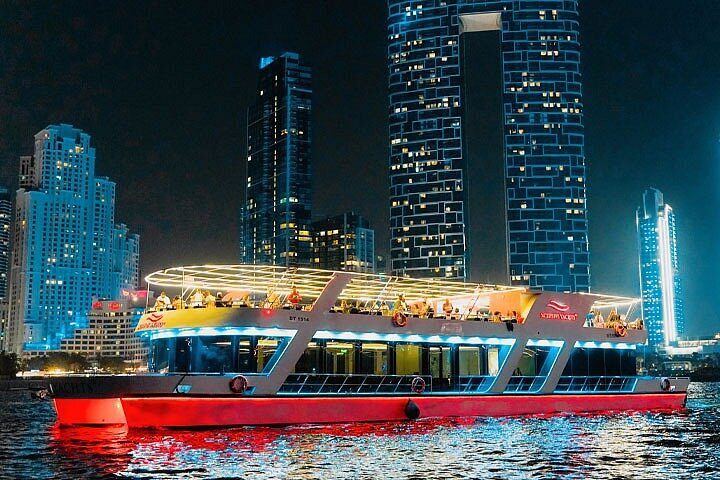 Dubai Marina yacht dinner cruise showcasing modern luxury yacht, elegant seating, and premium cruise dining experience
