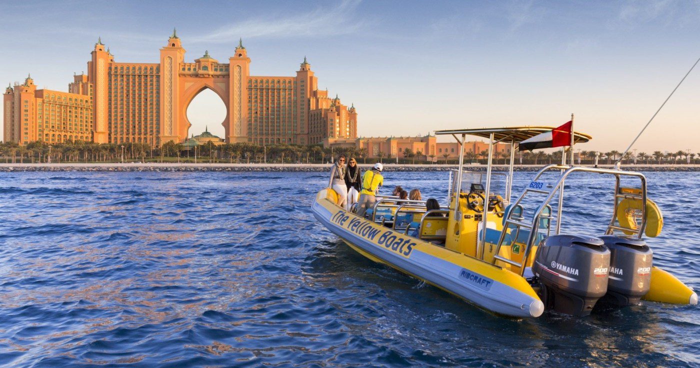 Yellow Boat Dubai speed boat tour cruising past Atlantis and Dubai Marina with iconic skyline views