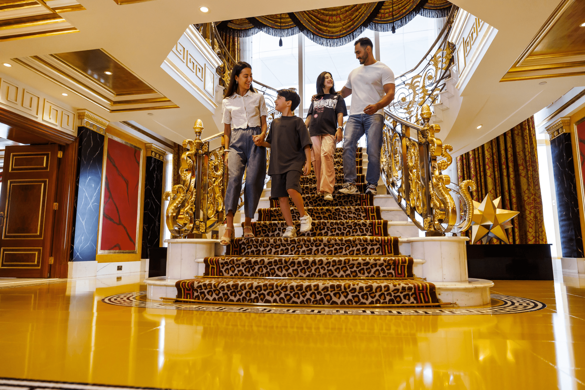 Inside Burj Al Arab guided tour showcasing luxury interiors, gold décor, UMA lounge and Al Iwan restaurant Dubai